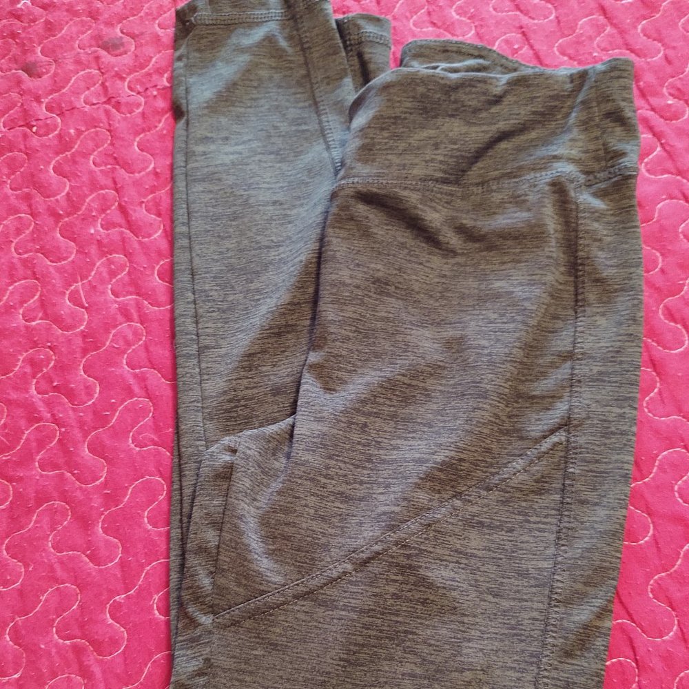 Green with black background Leggings Size S/M
